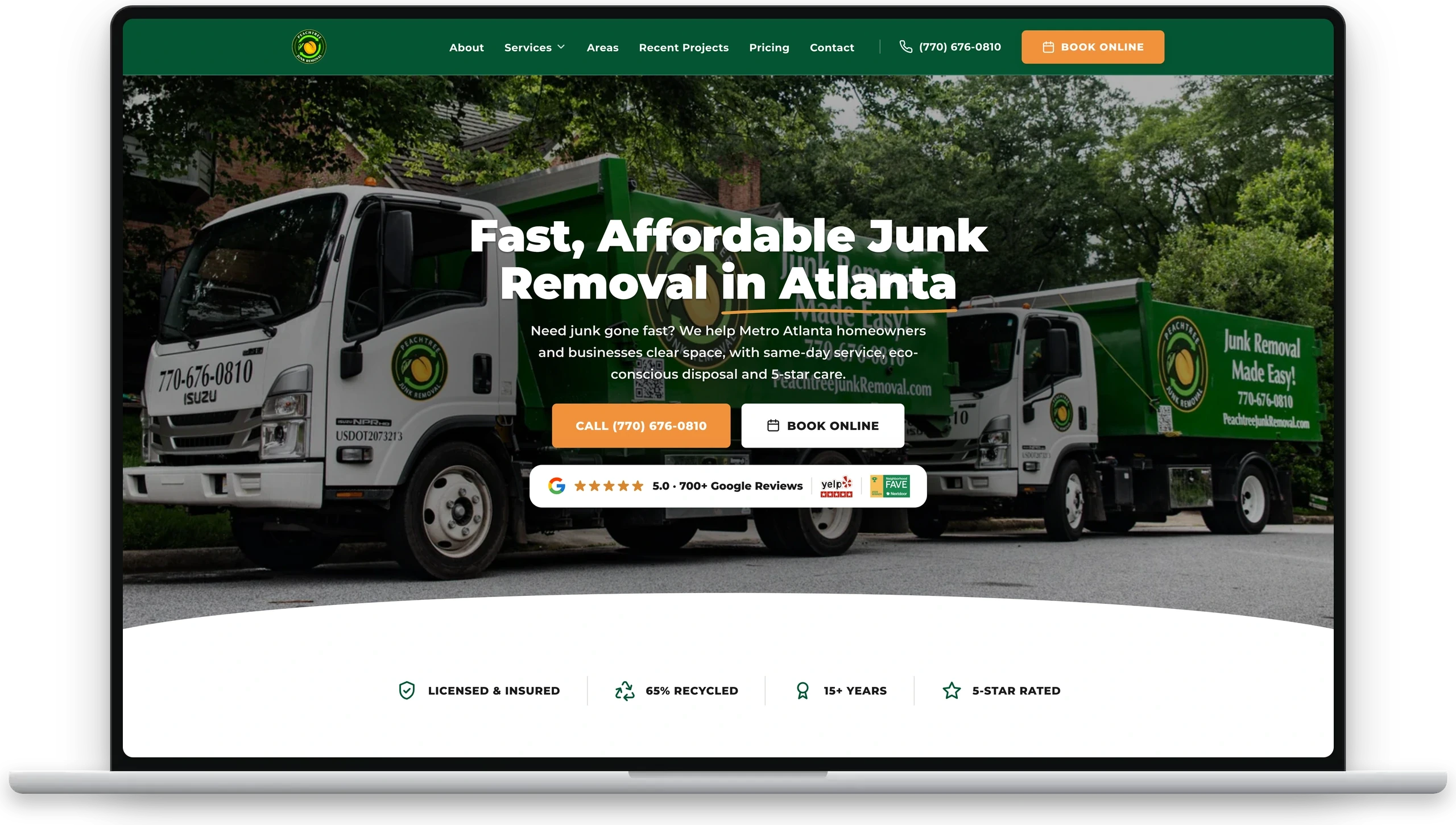 Peachtree Junk Removal homepage on a MacBook — Atlanta junk removal website with a branded green truck hero and book-online call to action.